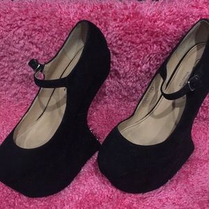 Black platform heels.